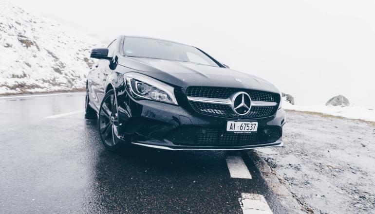 mercedes benz car on a mountain road
