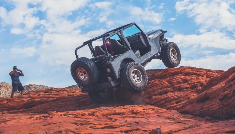 jeep wrangler on a rock 